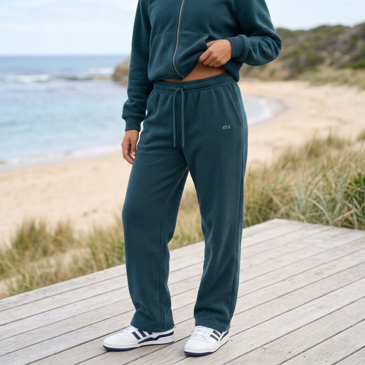 Square version of the deep-teal sweatpants detail image
